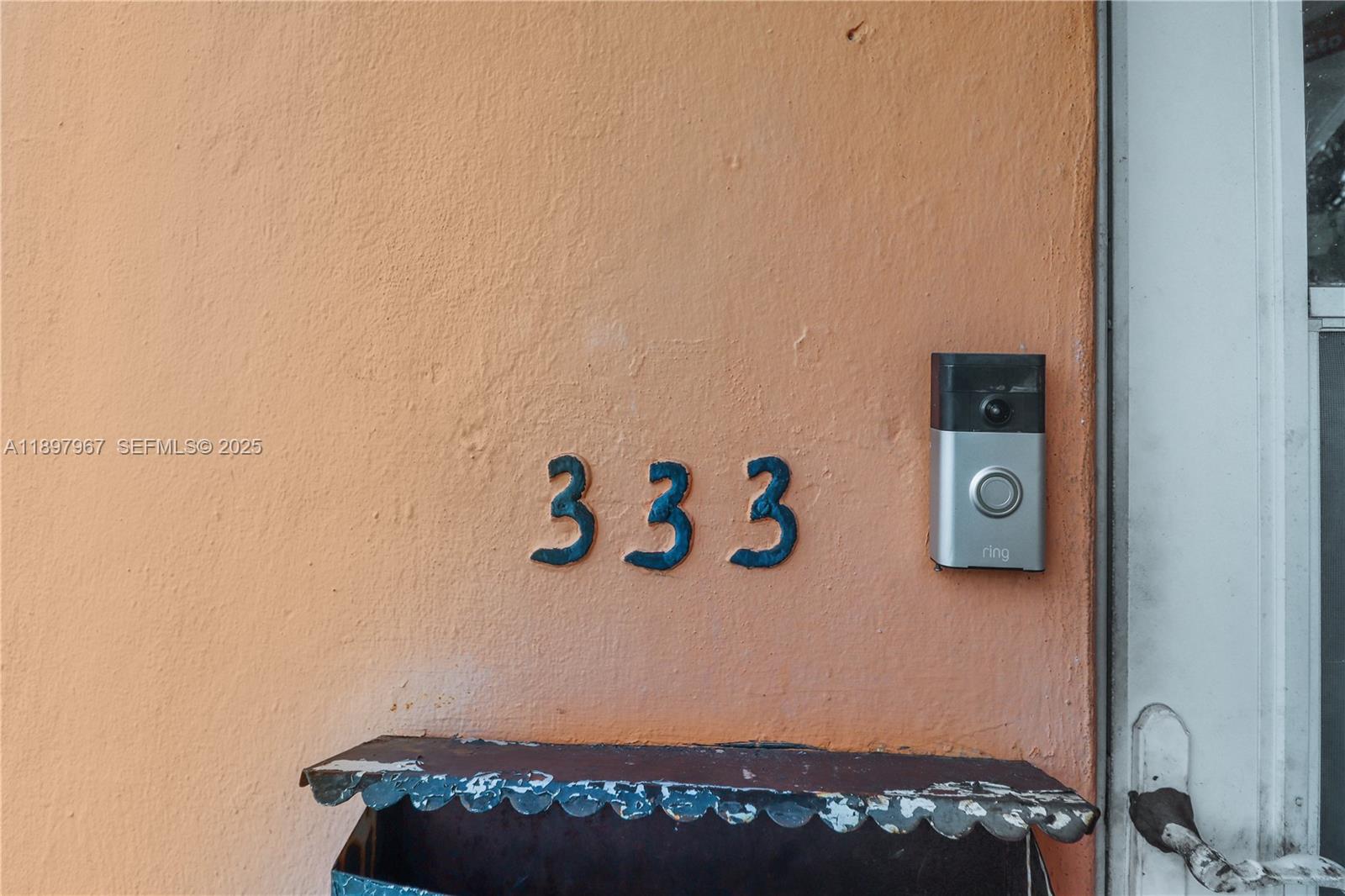 333 Southwest 30th Avenue Miami, FL 33135 - Photo 2 of 27 a bedroom with a bed and couch