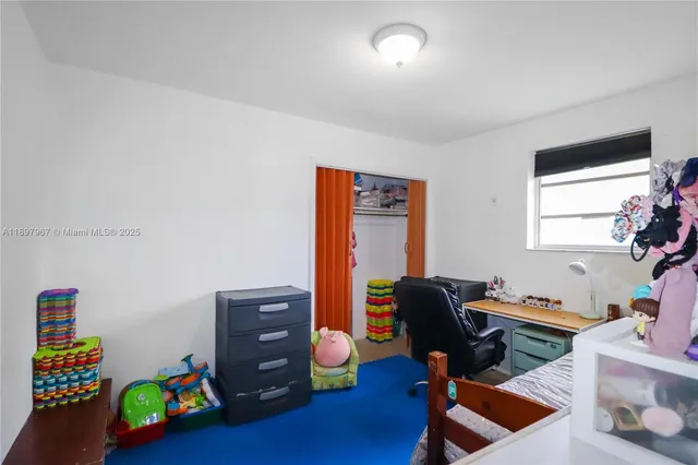 a room with toys and wooden floor