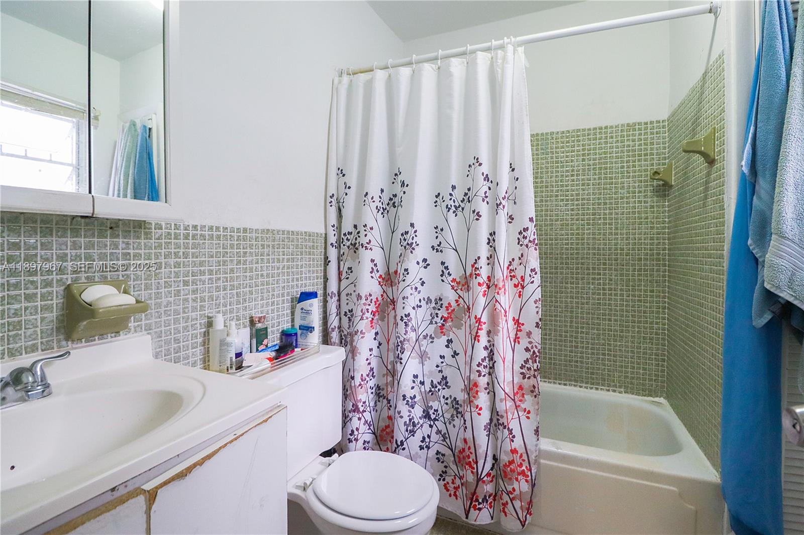 333 Southwest 30th Avenue Miami, FL 33135 - Photo 23 of 27 a bathroom with a sink toilet and shower