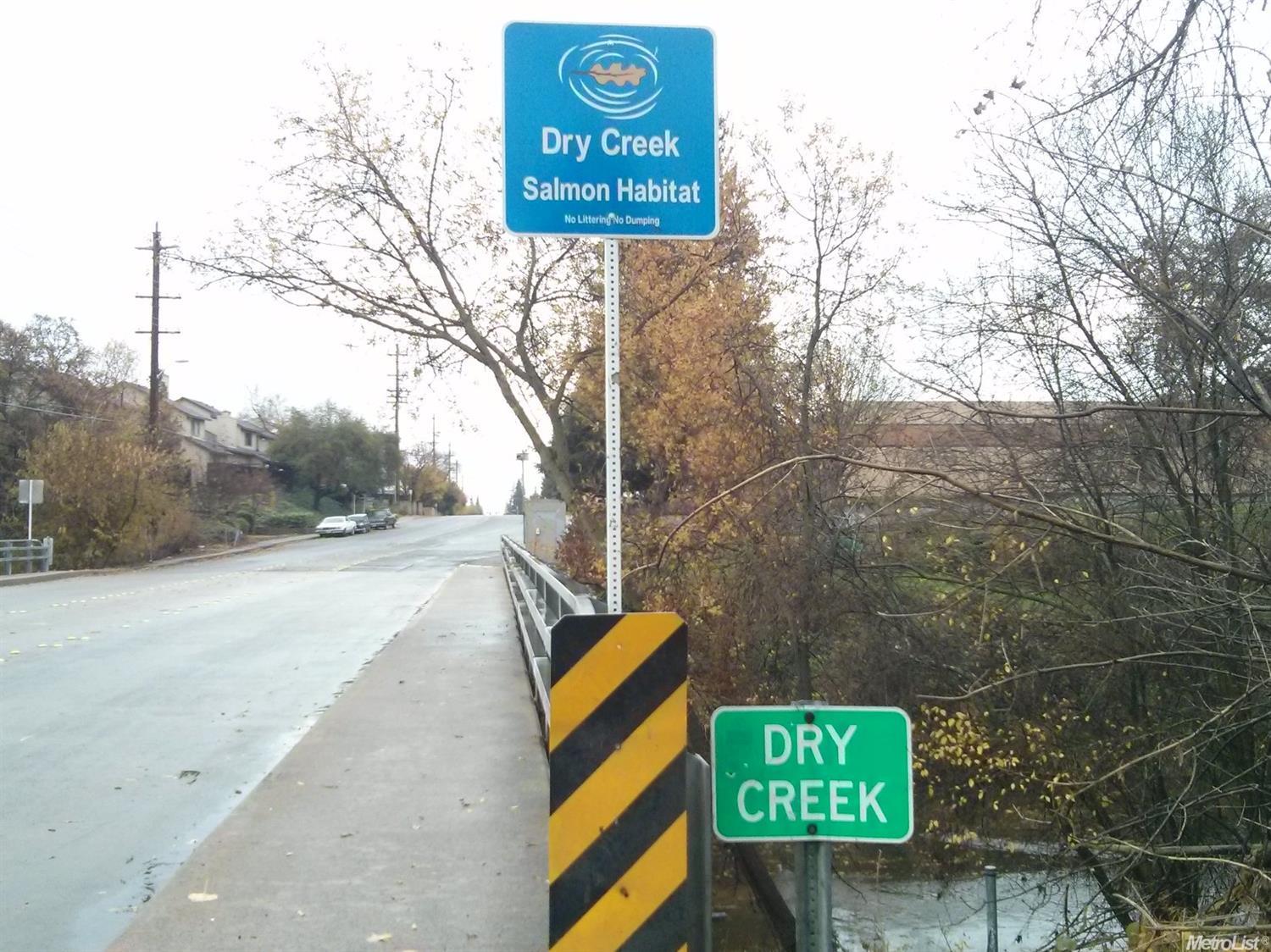 648 Riverside Avenue Roseville, CA 95678 - Photo 4 of 6 a sign that is on the side of a road