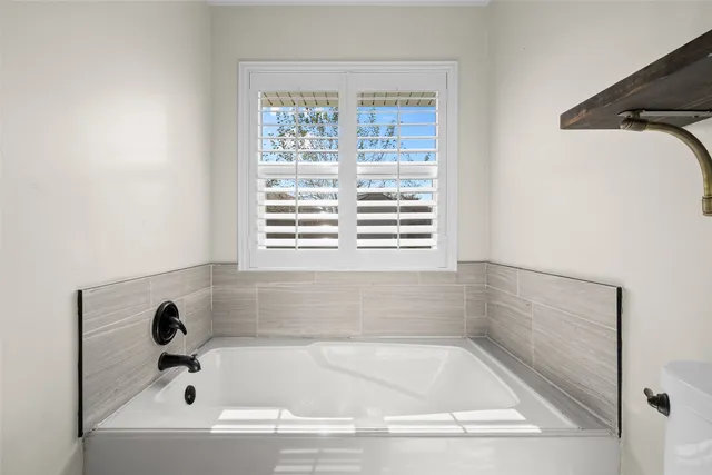 a bathroom with a bathtub