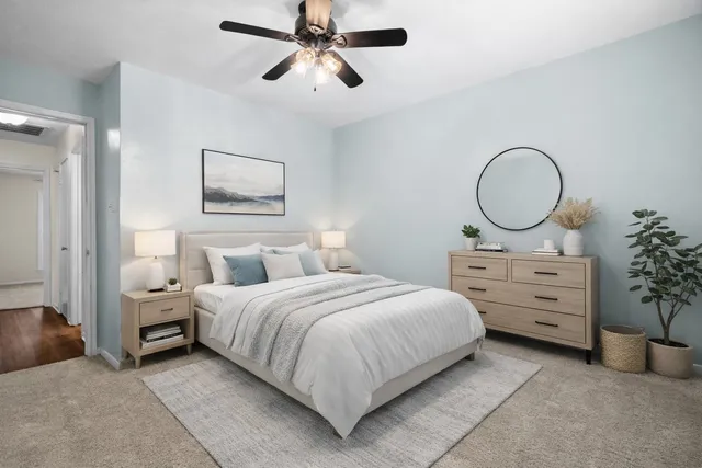 a front view of a house with swimming pool having outdoor seating