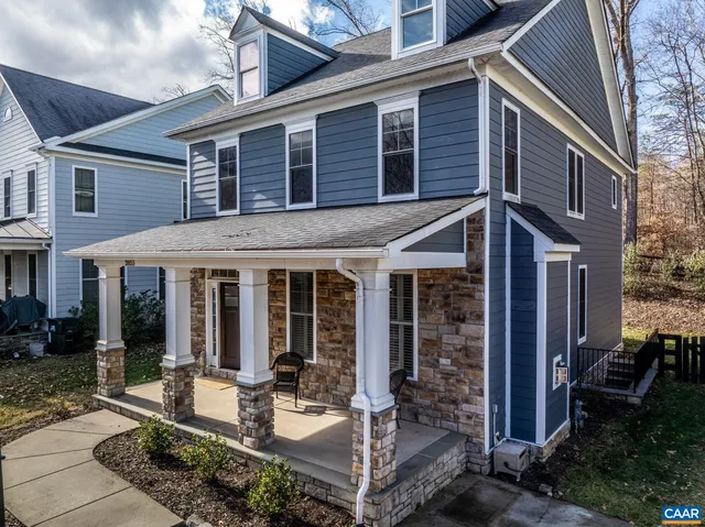 a view of a street with sitting area
