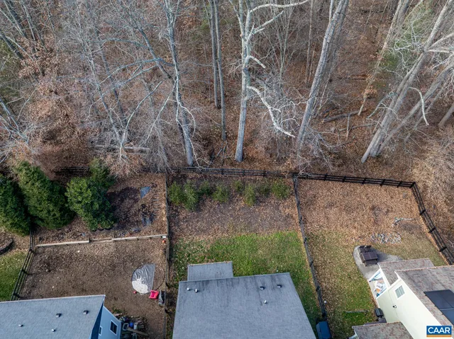a view of a back yard from a balcony