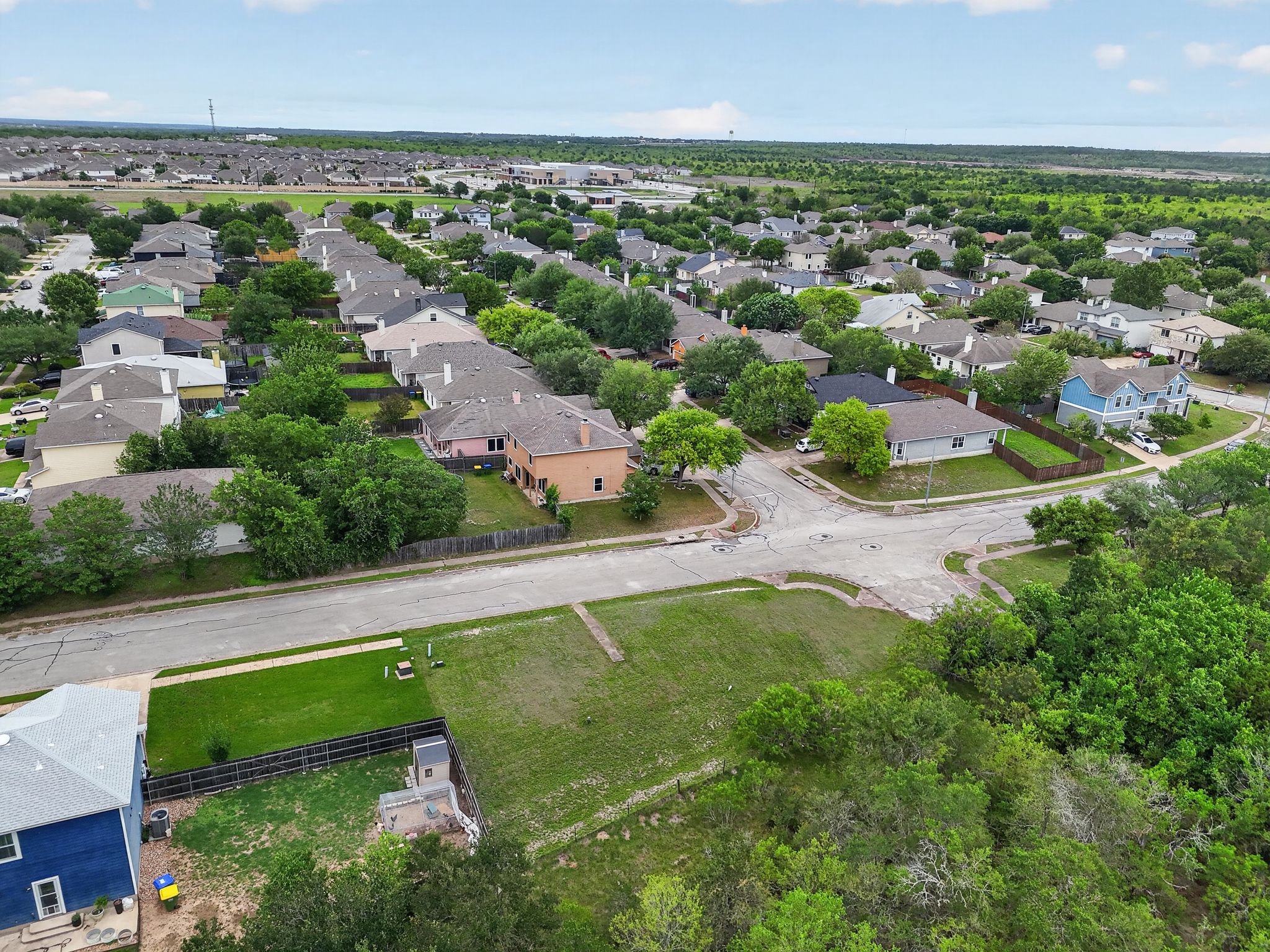 11908 Athens Street Manor, TX 78653 - Photo 5 of 15 an aerial view of a houses with a yard