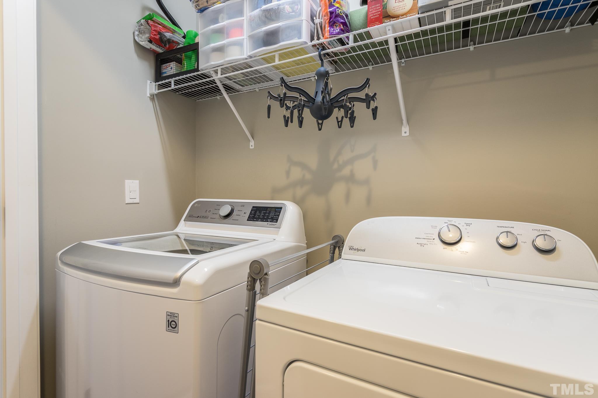 218 Irving Way Durham, NC 27703 - Photo 20 of 41 a utility room with dryer and washer