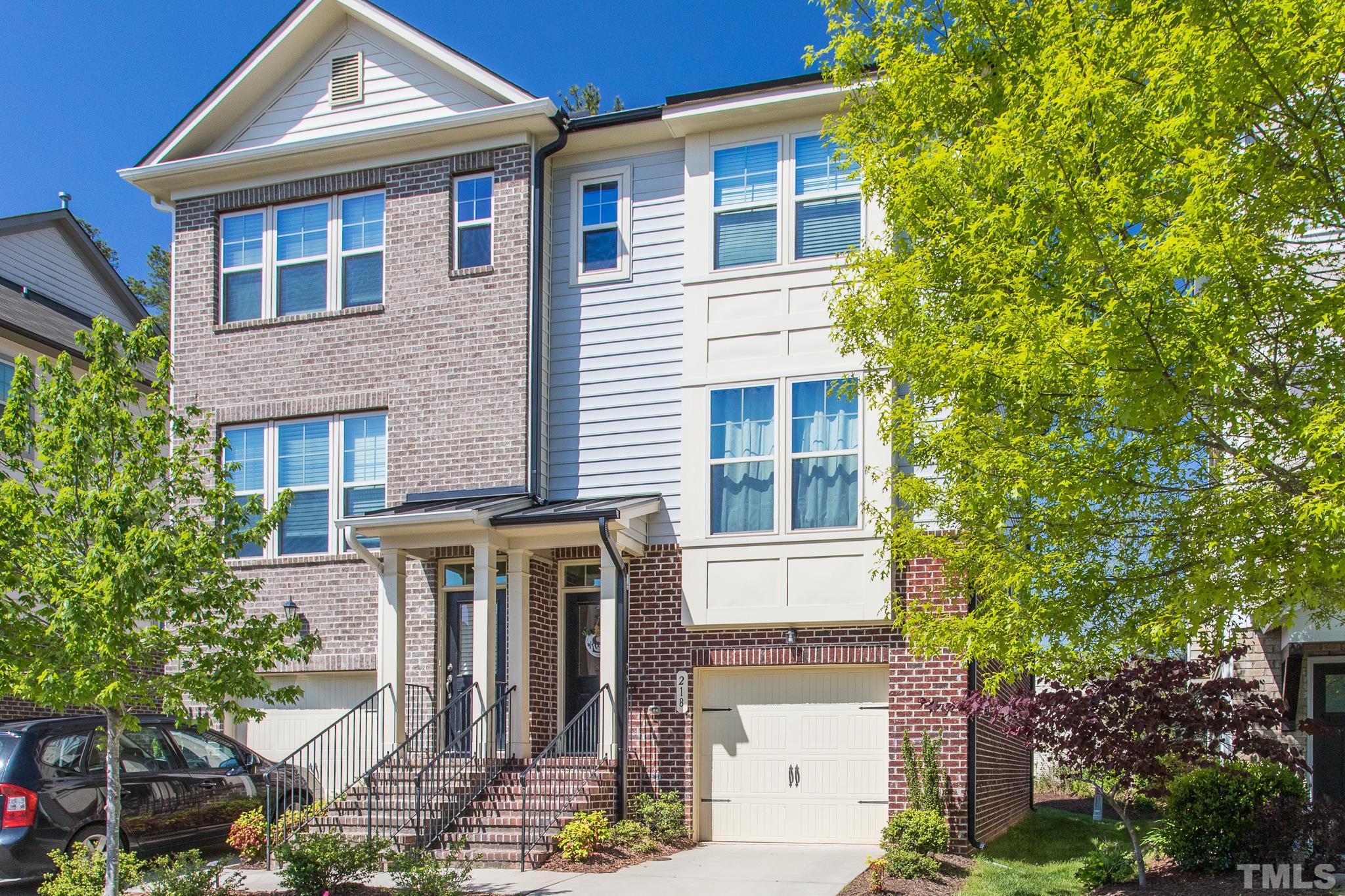 218 Irving Way Durham, NC 27703 - Photo 2 of 41 a front view of a house with garden
