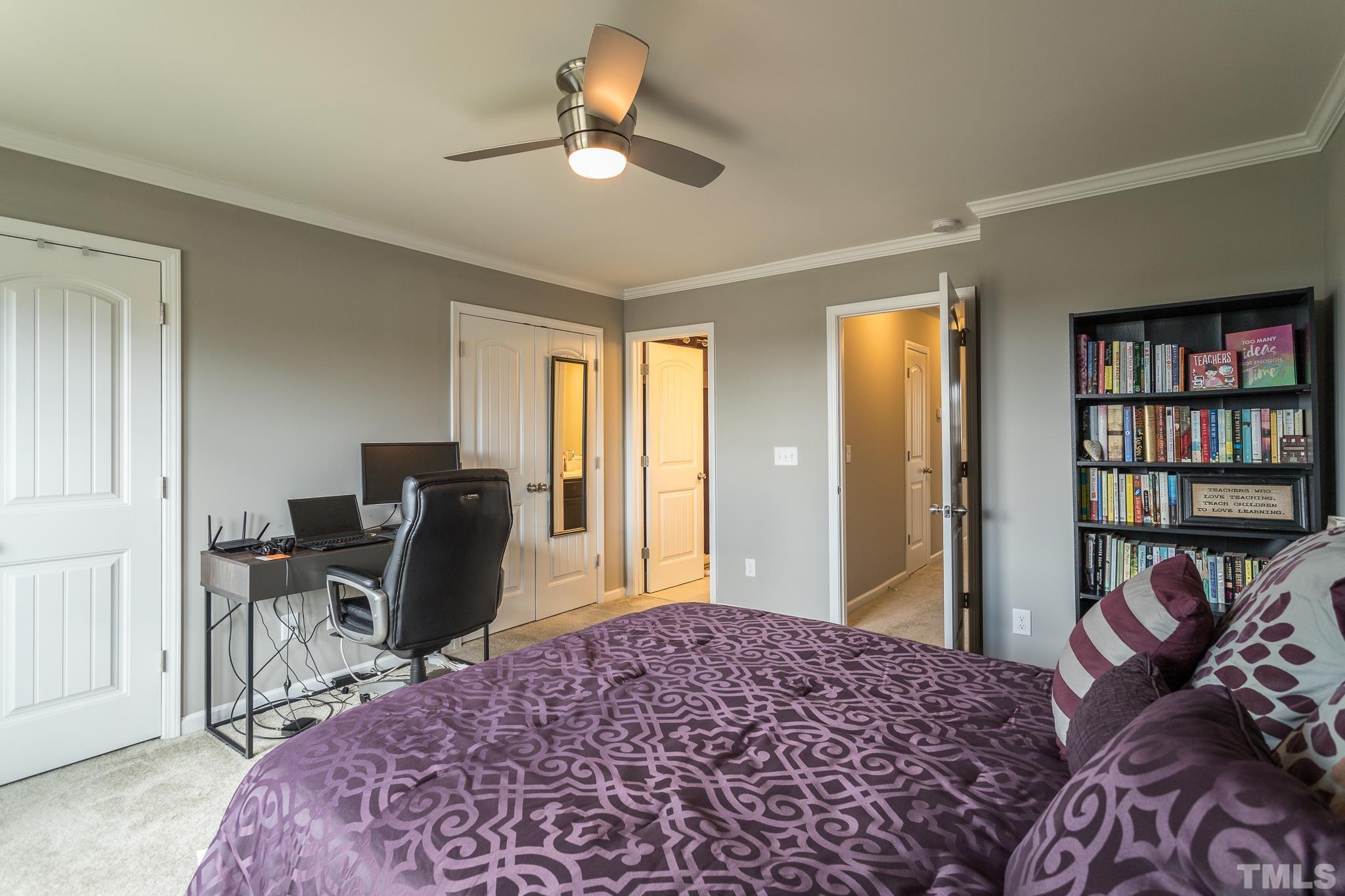 218 Irving Way Durham, NC 27703 - Photo 25 of 41 a bedroom with a bed and furniture