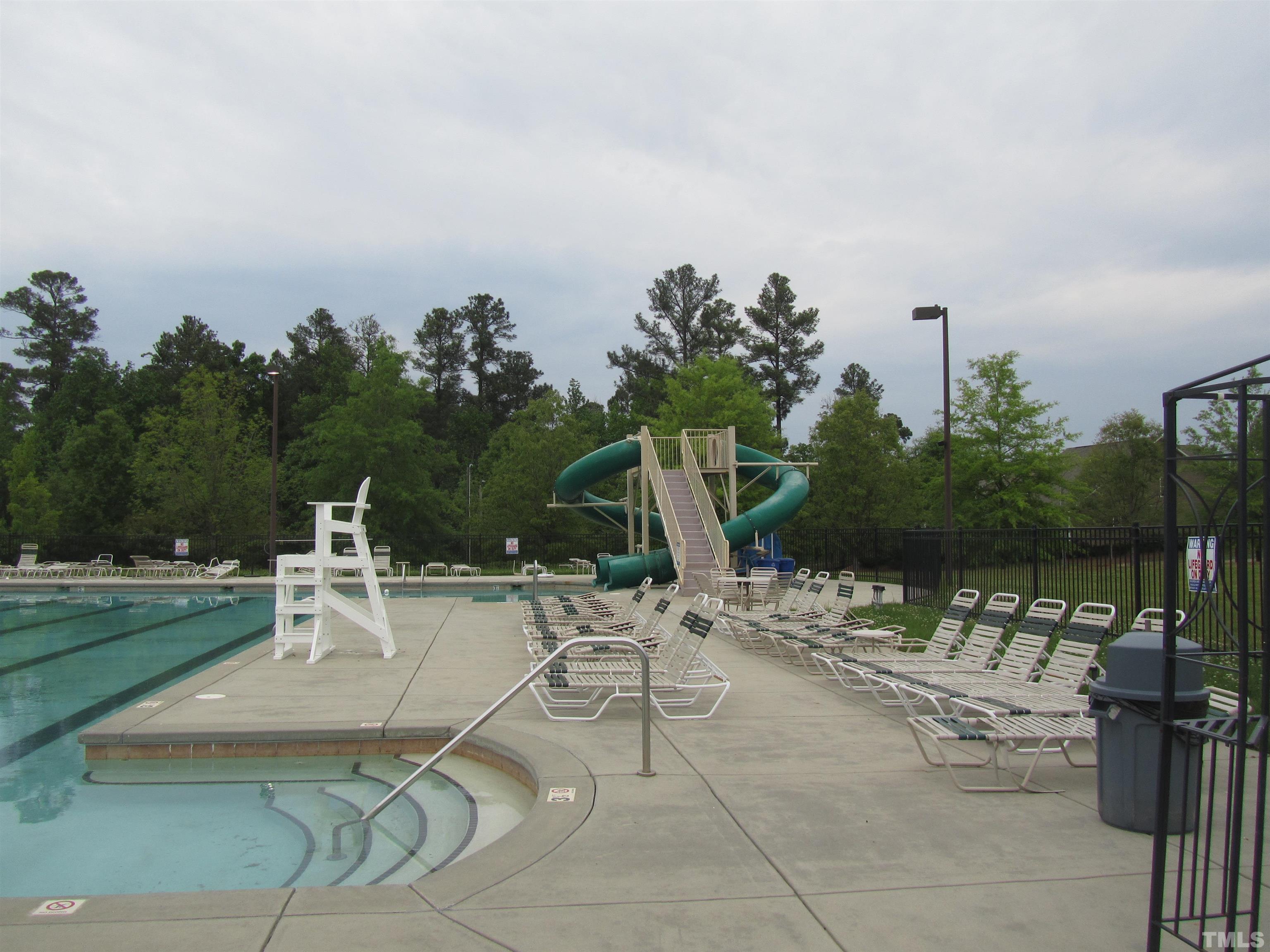 218 Irving Way Durham, NC 27703 - Photo 38 of 41 a view of a yard with a table and chairs