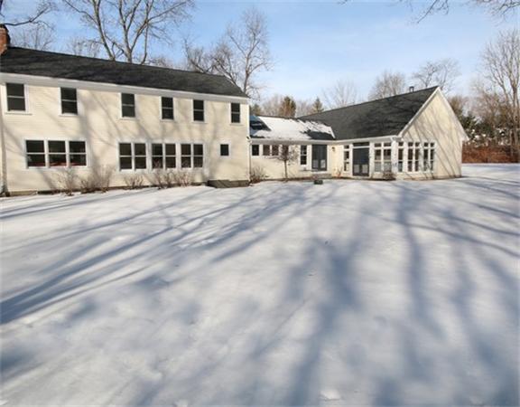 8 Meadowbrook Road Lincoln, MA 01773 - Photo 25 of 26 a view of a white house with a yard