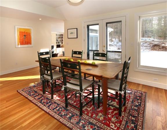 8 Meadowbrook Road Lincoln, MA 01773 - Photo 4 of 26 a view of a dining room with furniture and wooden floor
