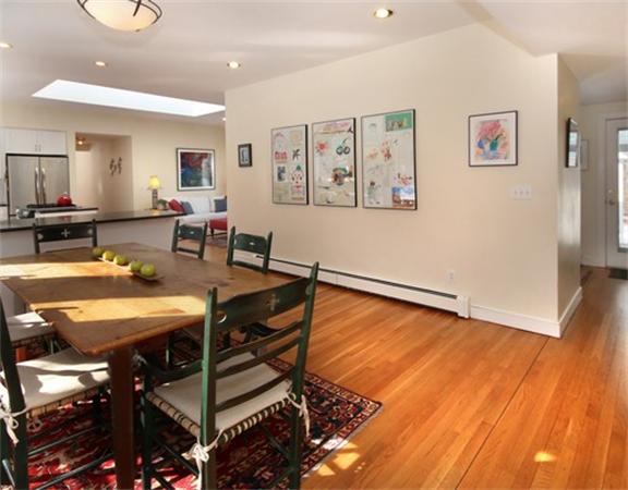 8 Meadowbrook Road Lincoln, MA 01773 - Photo 9 of 26 a dining hall with stainless steel appliances a dining table and chairs with wooden floor