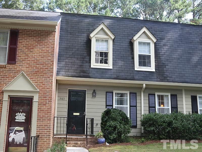 3163 Morningside Drive Raleigh, NC 27607 - Photo 1 of 18 a front view of a house with garden