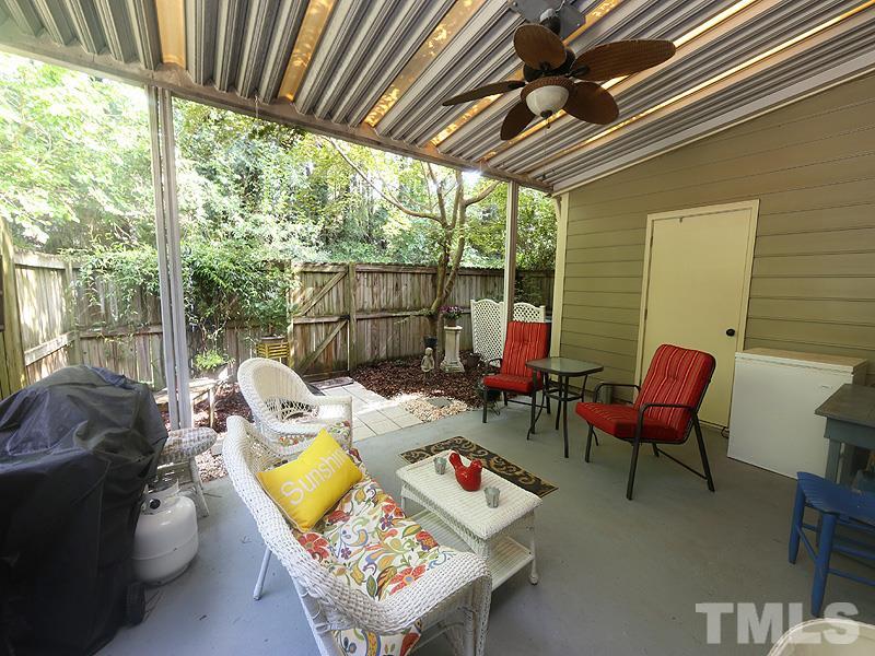 3163 Morningside Drive Raleigh, NC 27607 - Photo 14 of 18 a balcony with furniture and a large window