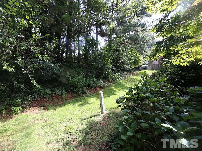 3163 Morningside Drive Raleigh, NC 27607 - Photo 15 of 18 a view of a yard with plants