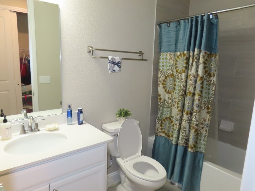 75136 White Rabbit Avenue Yulee, FL 32097 - Photo 20 of 23 a bathroom with a sink toilet and shower