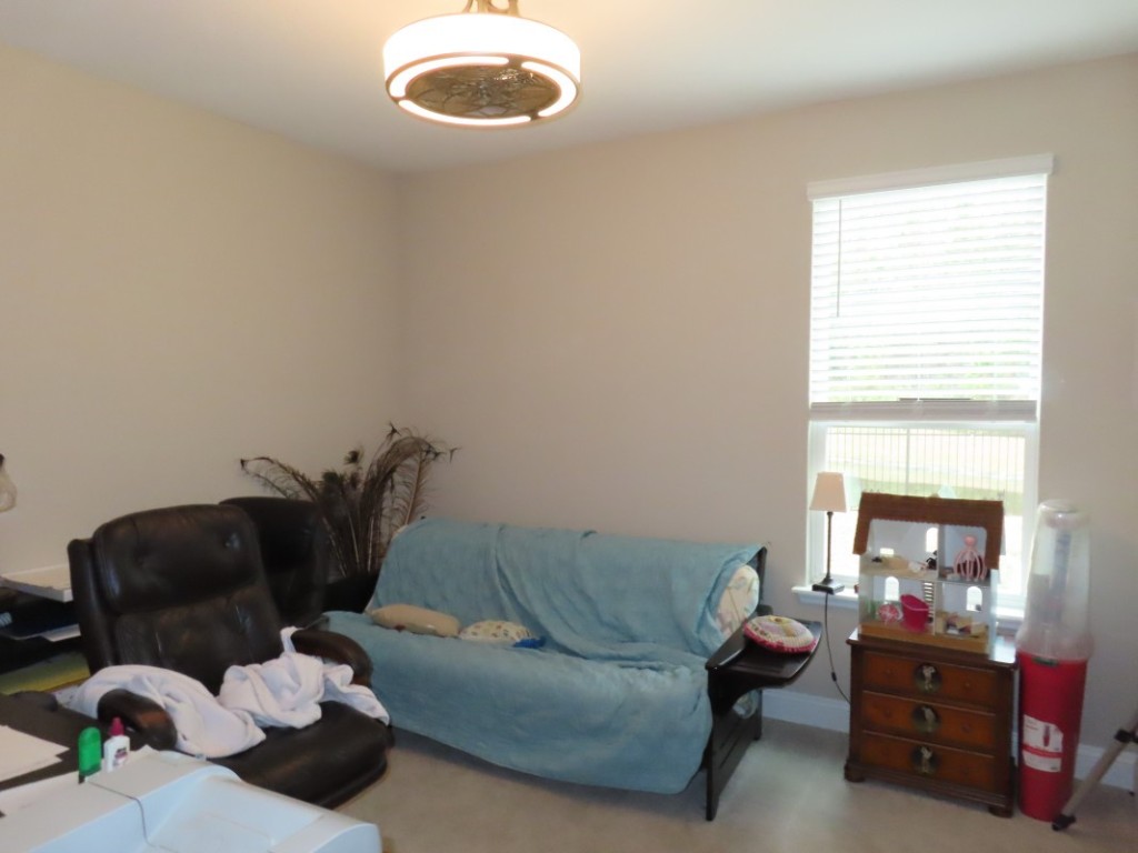 75136 White Rabbit Avenue Yulee, FL 32097 - Photo 23 of 23 a living room with furniture