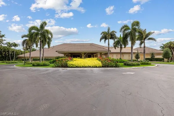 a view of a street and a building in the background