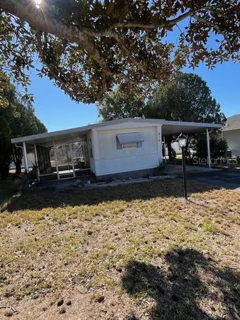 a view of a back yard of the house