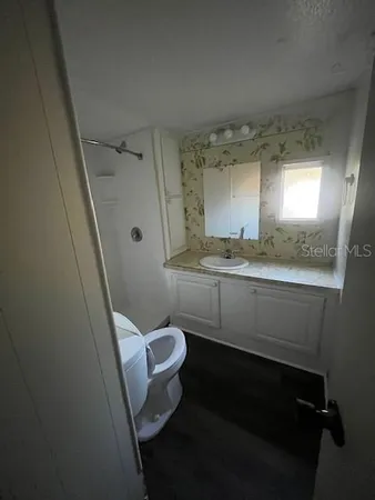 a view of a kitchen with a sink