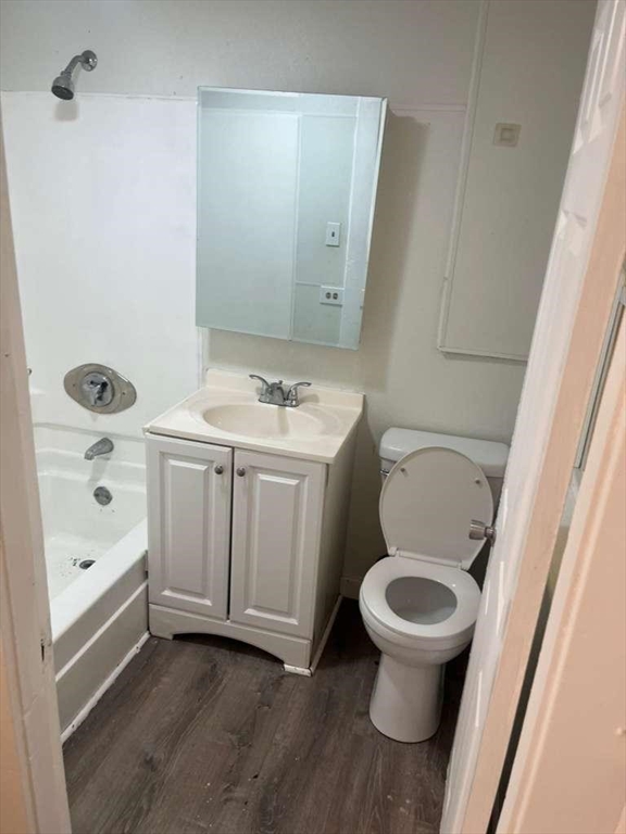 1709 Pleasant Street, Unit 2W Fall River, MA 02723 - Photo 6 of 8 a bathroom with a toilet and a sink