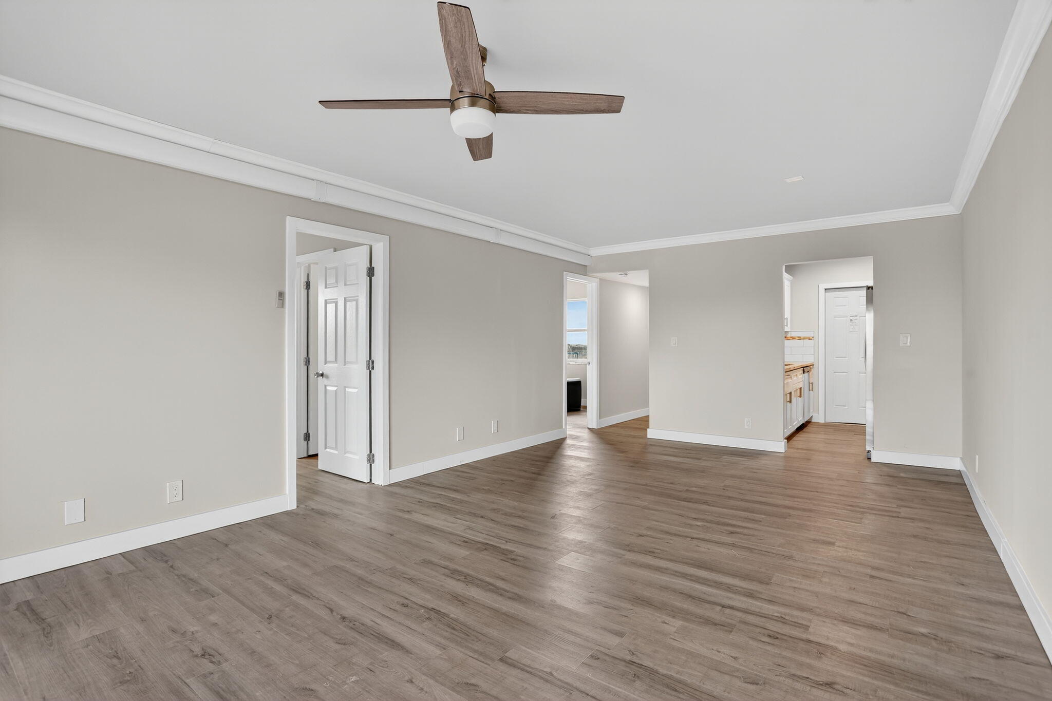 3201 Northeast 14th Street Causeway, Unit 501 Pompano Beach, FL 33062 - Photo 20 of 32 a view of an empty room with wooden floor
