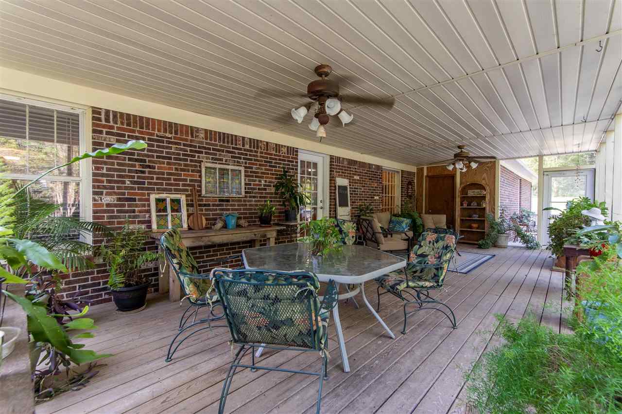 4560 Clifton Road Savannah, TN 38372 - Photo 17 of 25 a outdoor dining space with furniture