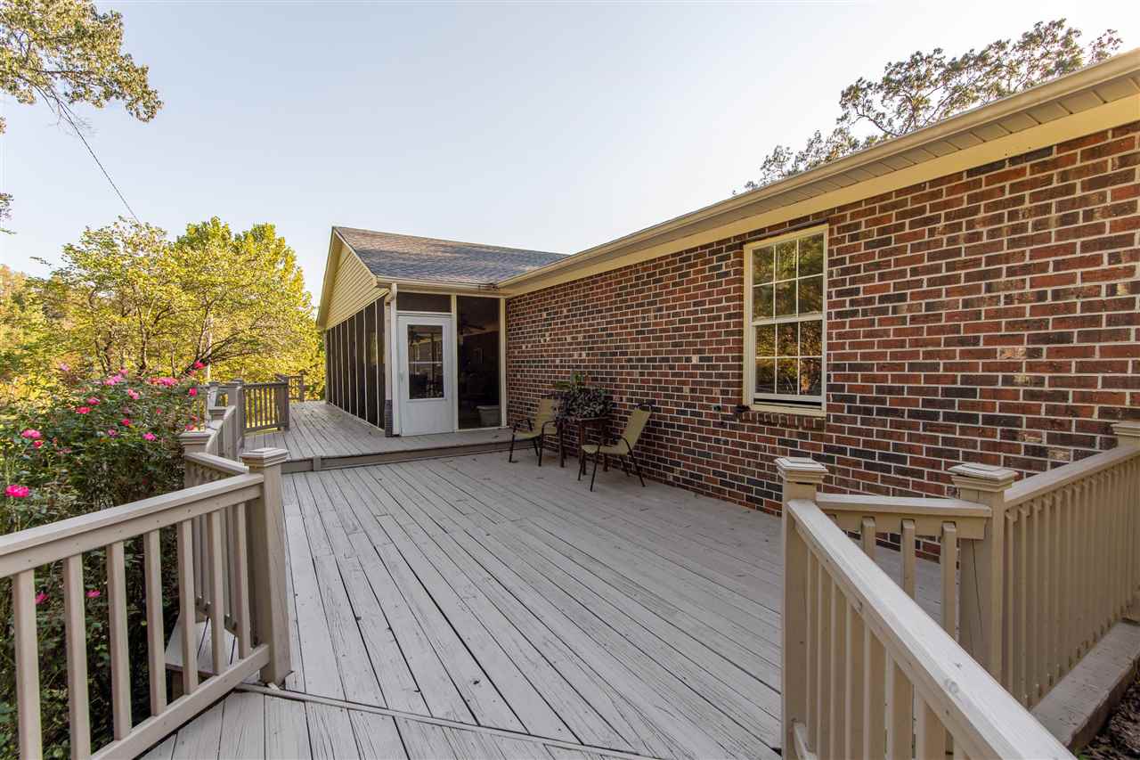 4560 Clifton Road Savannah, TN 38372 - Photo 18 of 25 a backyard of a house with seating space