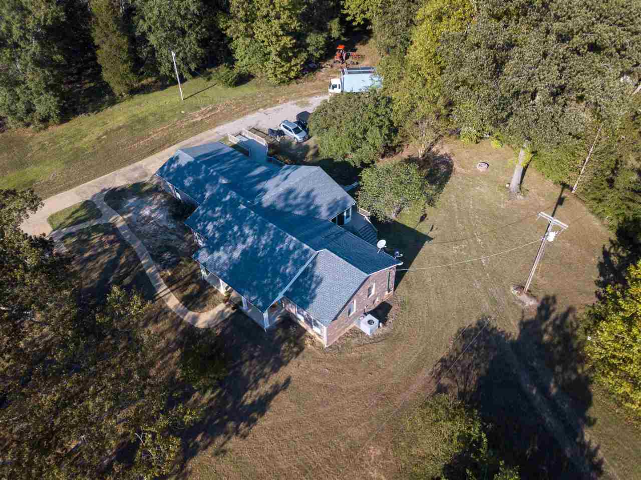 4560 Clifton Road Savannah, TN 38372 - Photo 4 of 25 an aerial view of a house with a yard