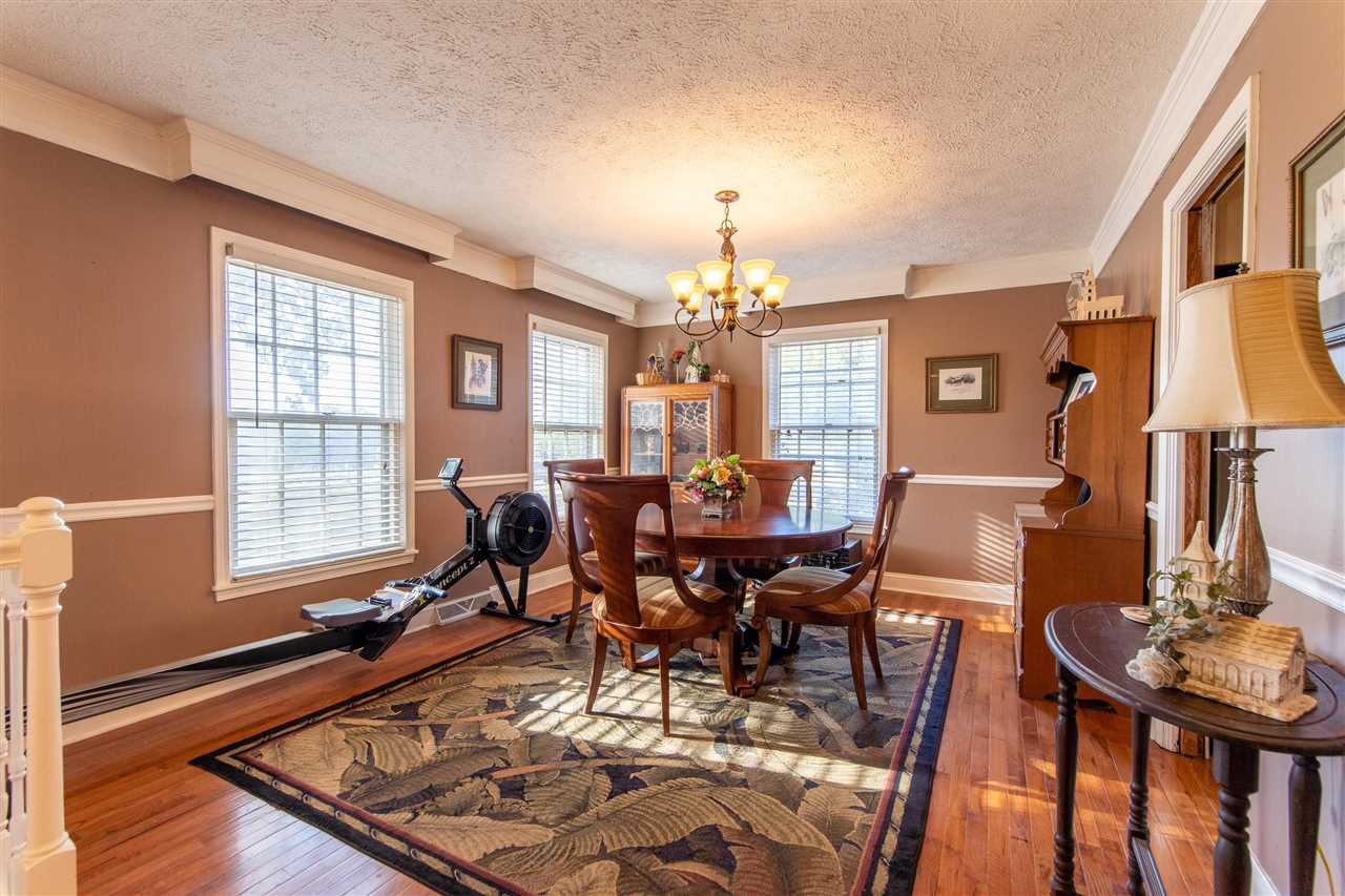 4560 Clifton Road Savannah, TN 38372 - Photo 6 of 25 a view of a dining room with furniture window and wooden floor
