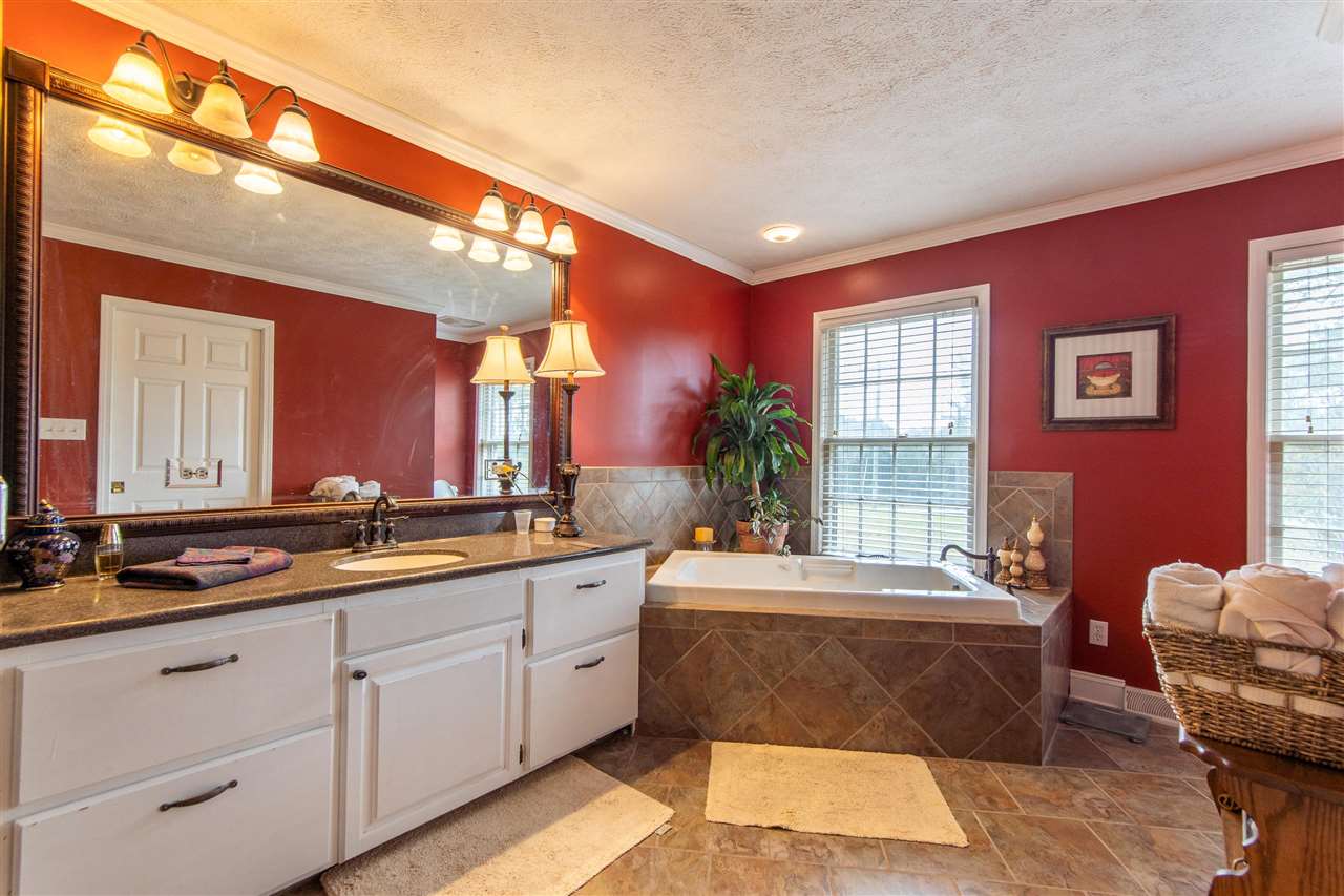 4560 Clifton Road Savannah, TN 38372 - Photo 10 of 25 a view of living room with granite countertop furniture and window