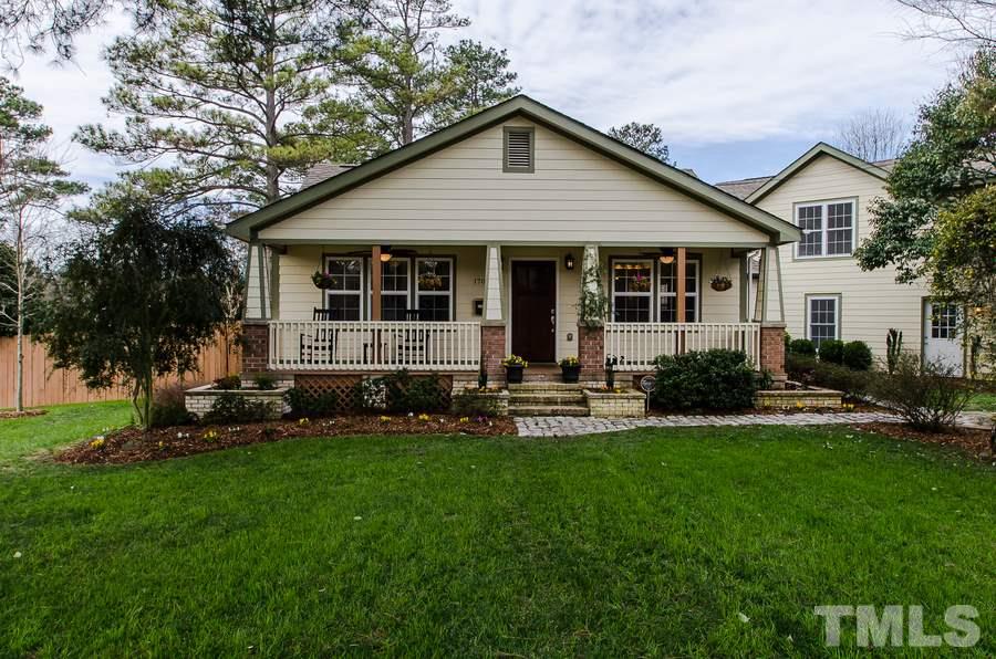 1705 Midwood Drive Raleigh, NC 27604 - Photo 1 of 24 a front view of house with yard and green space