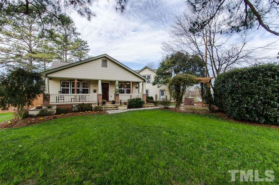 1705 Midwood Drive Raleigh, NC 27604 - Photo 2 of 24 a front view of a house with a yard
