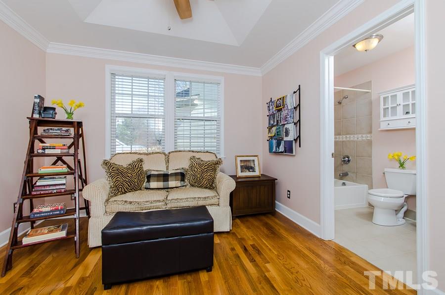 1705 Midwood Drive Raleigh, NC 27604 - Photo 15 of 24 a living room with furniture and wooden floor