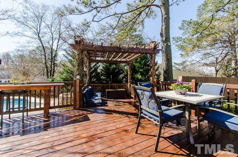 1705 Midwood Drive Raleigh, NC 27604 - Photo 21 of 24 a view of a chairs and table on the wooden floor