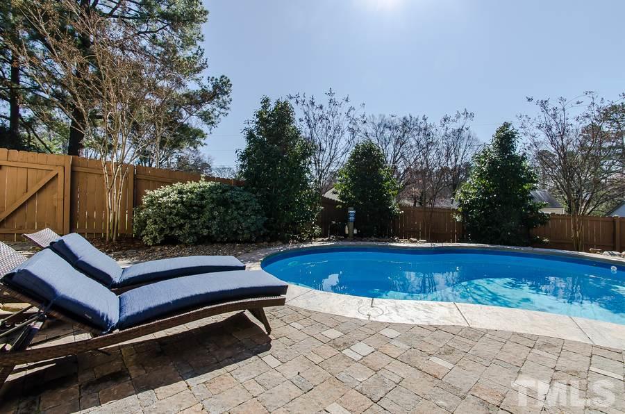 1705 Midwood Drive Raleigh, NC 27604 - Photo 22 of 24 a view of a outdoor space with swimming pool and furniture