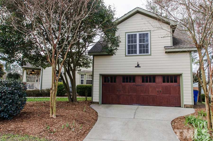 1705 Midwood Drive Raleigh, NC 27604 - Photo 4 of 24 a front view of a house with garden