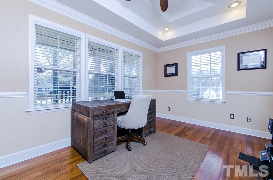 1705 Midwood Drive Raleigh, NC 27604 - Photo 10 of 24 a view of a workspace with furniture and a window
