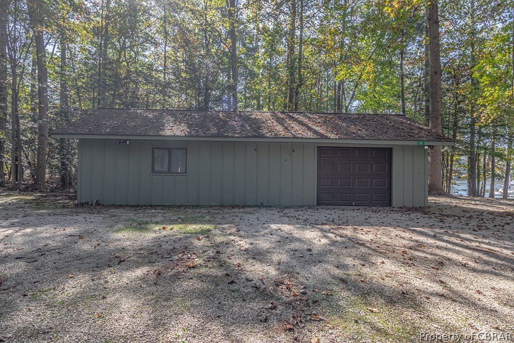 131 Ewell Road Lancaster, VA 22503 - Photo 6 of 50 a house with trees in front of it