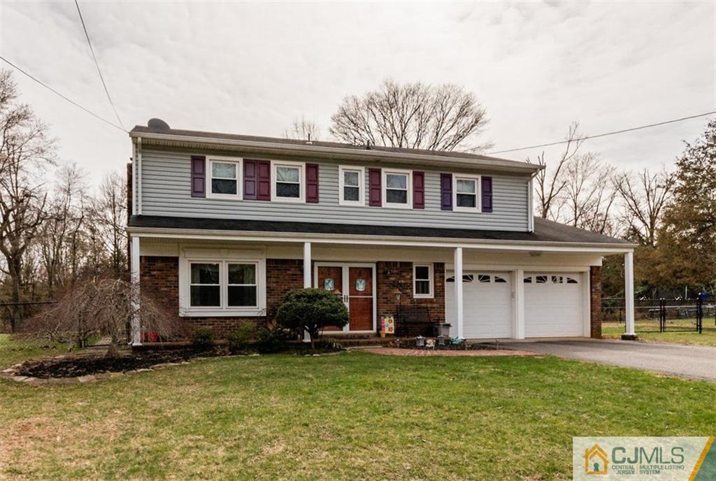 40 Smith Road Somerset, NJ 08873 - Photo 1 of 22 a front view of a house with garden