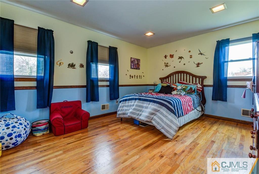 40 Smith Road Somerset, NJ 08873 - Photo 15 of 22 a bedroom with bed and window
