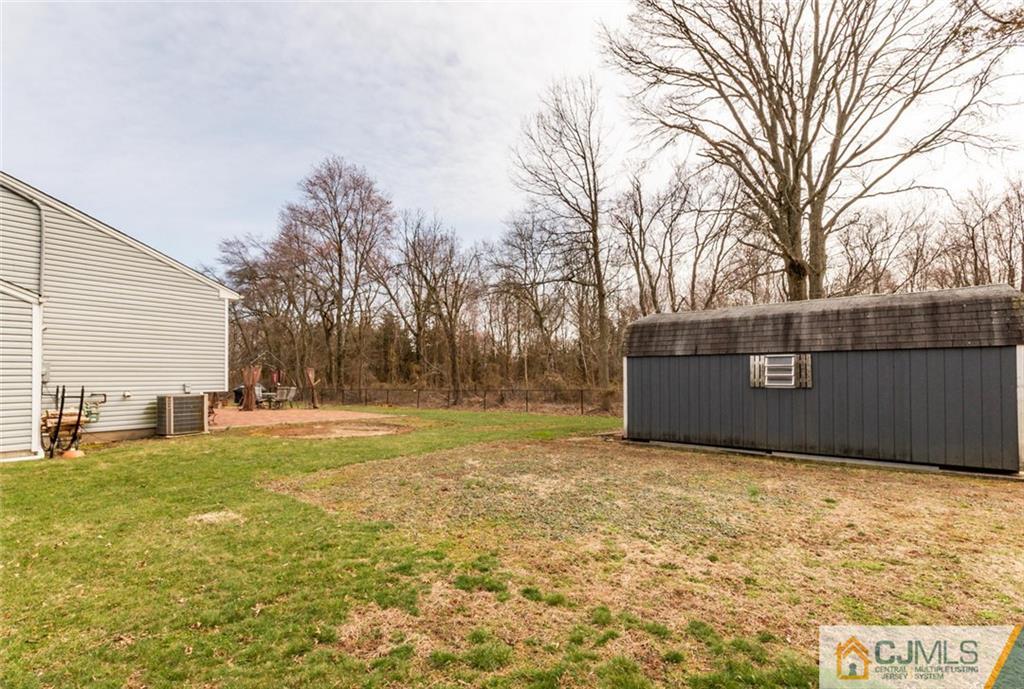40 Smith Road Somerset, NJ 08873 - Photo 19 of 22 a view of backyard with large trees