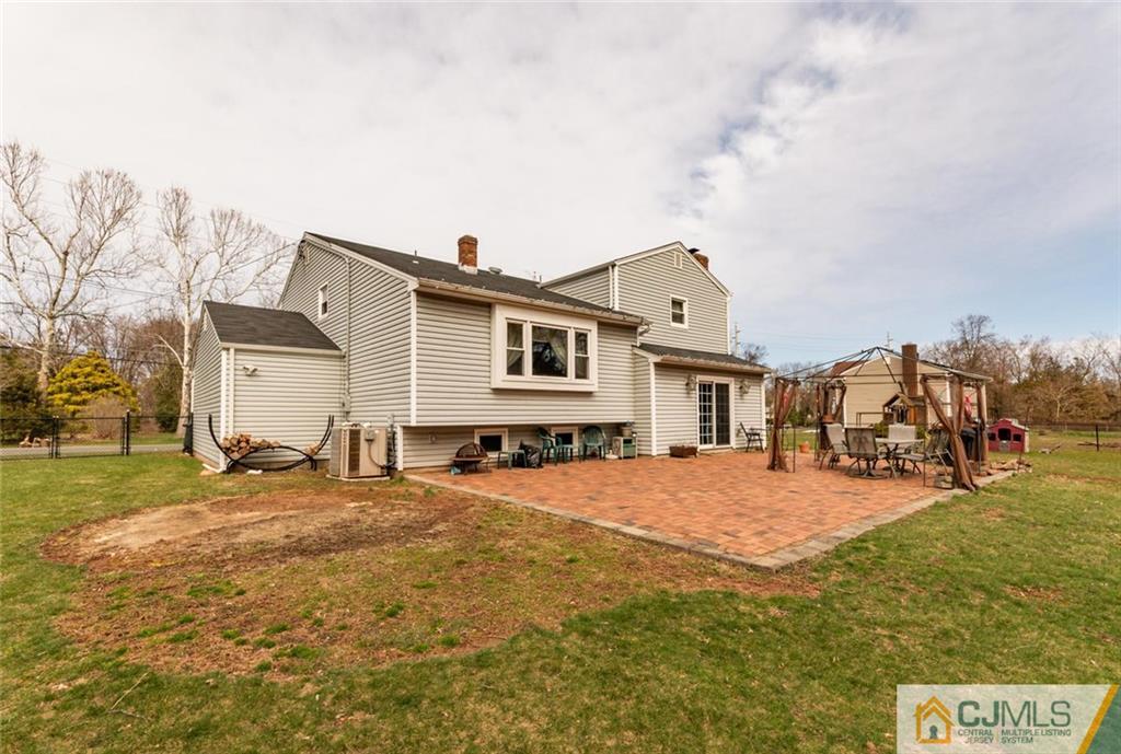 40 Smith Road Somerset, NJ 08873 - Photo 20 of 22 a view of a house with snow on the background