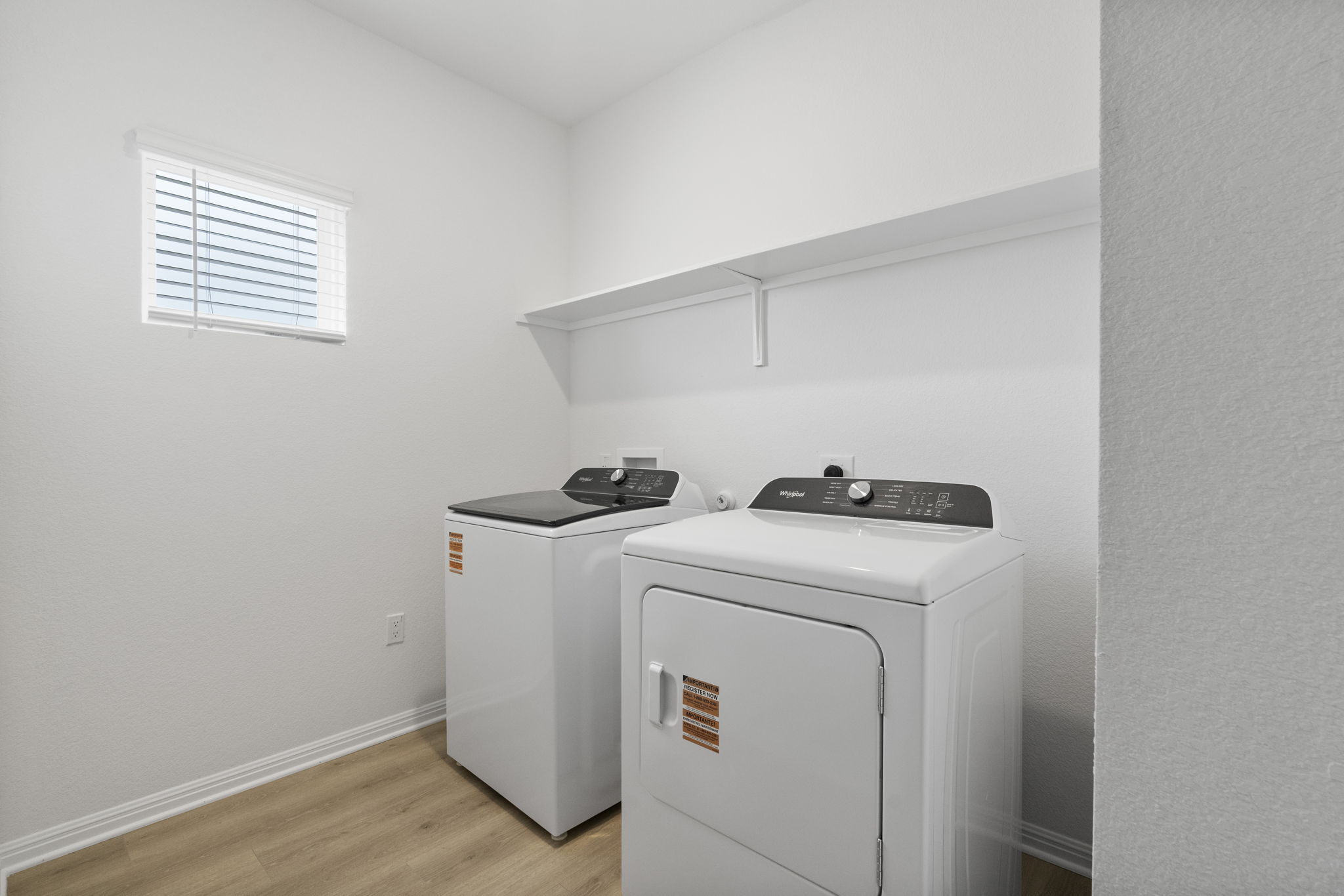 104 Boondoggle Ridge Cedar Creek, TX 78612 - Photo 23 of 33 a utility room with dryer and washer