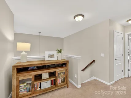 a kitchen with stainless steel appliances a stove and a refrigerator