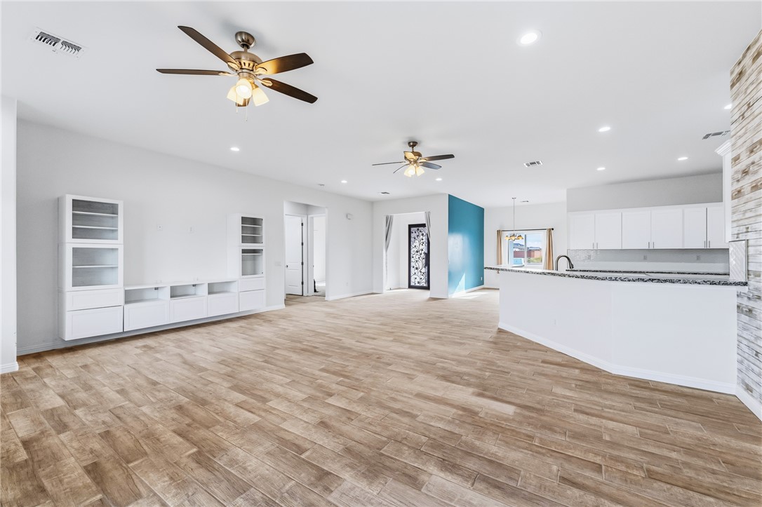 2385 Corwin Road Bullhead City, AZ 86442 - Photo 12 of 78 a view of an empty room with kitchen and kitchen view