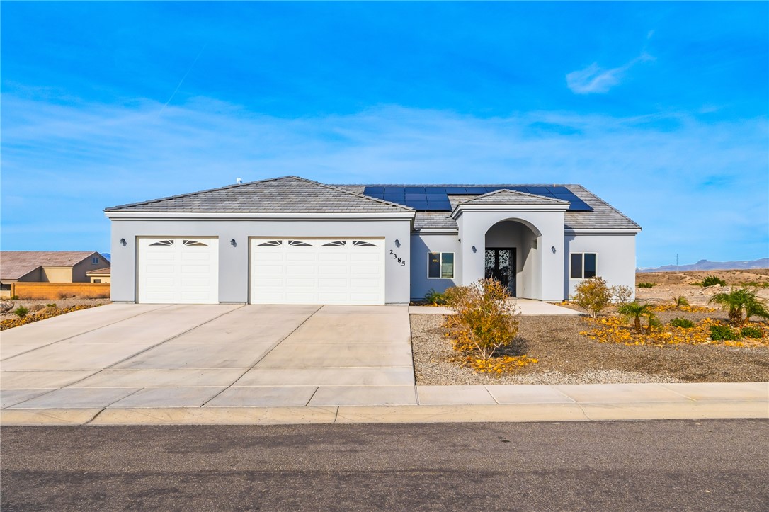 2385 Corwin Road Bullhead City, AZ 86442 - Photo 2 of 78 a view of a house with a outdoor space