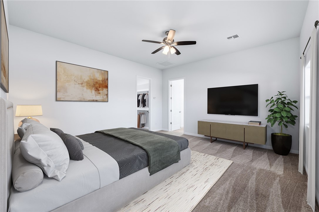2385 Corwin Road Bullhead City, AZ 86442 - Photo 32 of 78 a bedroom with a bed and a flat screen tv
