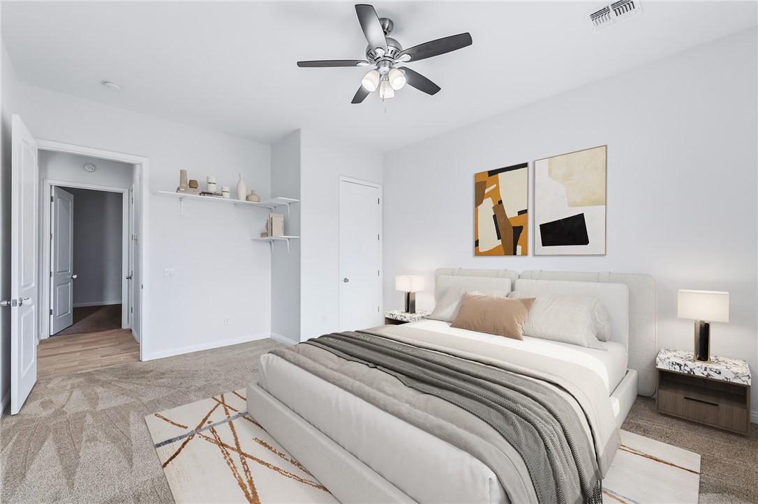 2385 Corwin Road Bullhead City, AZ 86442 - Photo 44 of 78 a bedroom with a bed and a chandelier
