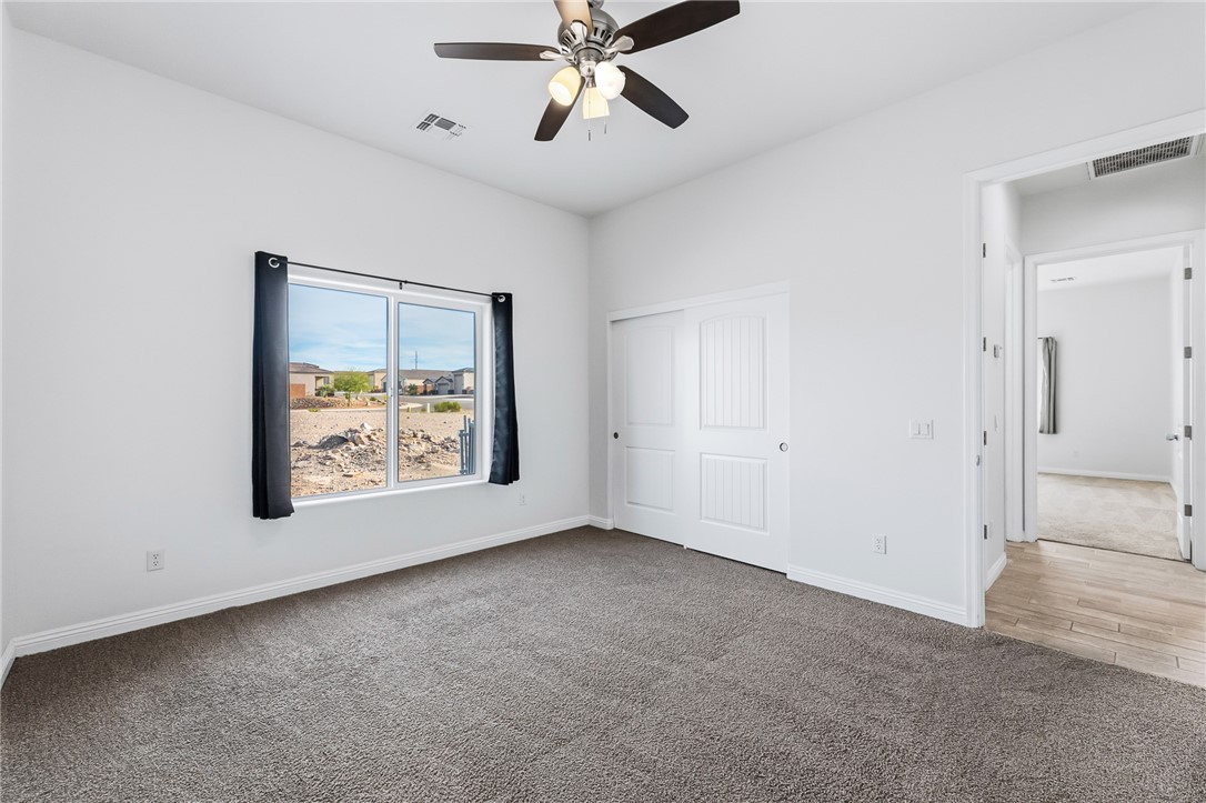 2385 Corwin Road Bullhead City, AZ 86442 - Photo 49 of 78 a view of room with window and ceiling fan